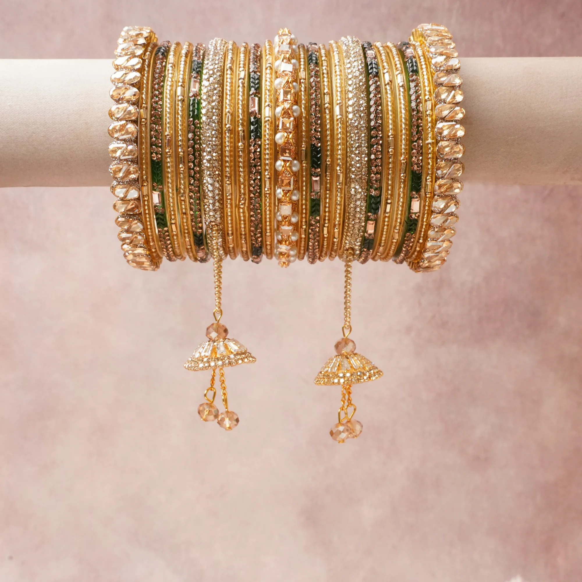 A commanding Gold anchors this beautiful set, enriched with accents of Forest Green, Champagne, Clear Crystal that add depth and dimension.

Featuring a striking composition of Gold-toned Base Metal, Glass Crystal, Forest Green Enamel, Faux Pearl, Seed Beads, this set carries intricate craftsmanship and strong presence. Grand in form, it is created for moments that deserve to be marked.